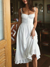Vestido midi liso con volantes en el bajo